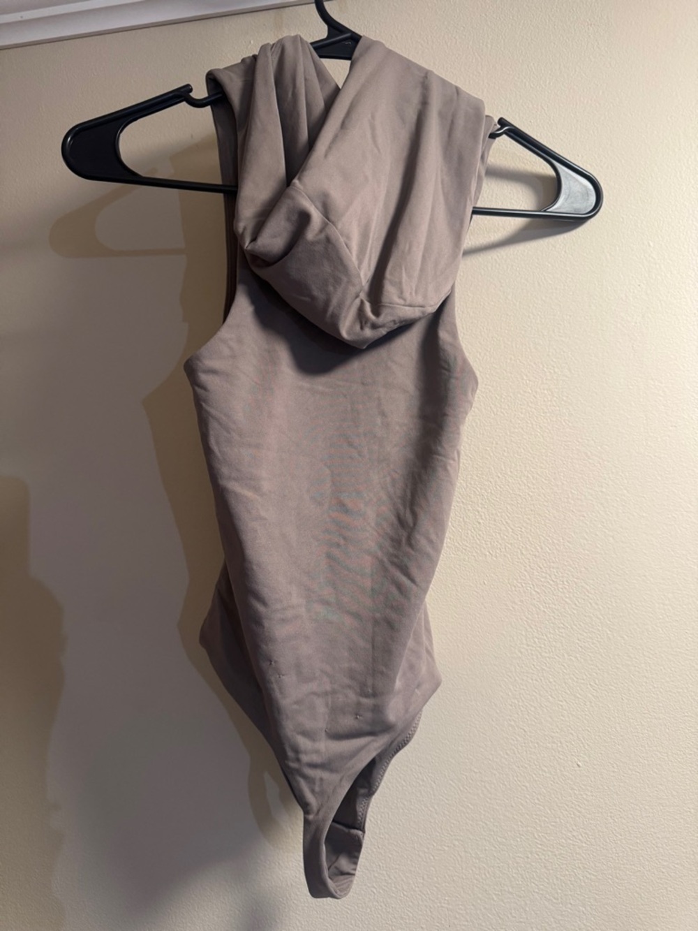 Aritzia Sleeveless Hooded Bodysuit in Taupe